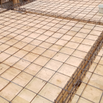 Análise de Valderci Malagosini Machado sobre os desafios das lajes treliçadas em áreas de transição entre ambientes e as soluções para garantir continuidade estrutural.